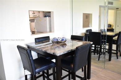 This furnished, turnkey, top floor condo features all new on Sunrise Lakes Phase III in Florida - for sale on GolfHomes.com, golf home, golf lot