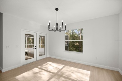 Welcome to your *completely renovated* concrete block 3 bed/2 on Rainbow Springs Golf and Country Club in Florida - for sale on GolfHomes.com, golf home, golf lot