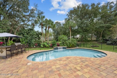 Discover your dream home in the exclusive Queens Harbour Yacht & on Queens Harbour Yacht and Country Club in Florida - for sale on GolfHomes.com, golf home, golf lot