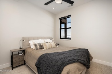 Experience immediate mountain living with this turnkey 3-story on Headwaters Golf Course At Granby Ranch in Colorado - for sale on GolfHomes.com, golf home, golf lot