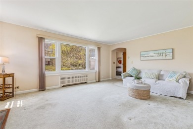 Welcome to 1440 Roanoke Ave, a charming cape-style home nestled on Sandy Pond Golf Course in New York - for sale on GolfHomes.com, golf home, golf lot