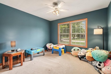 Spacious 5-Bedroom Home with Golf Course Views in Larimer Greens on Black Squirrel Golf Club in Indiana - for sale on GolfHomes.com, golf home, golf lot