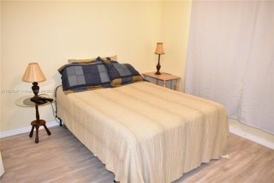 This furnished, turnkey, top floor condo features all new on Sunrise Lakes Phase III in Florida - for sale on GolfHomes.com, golf home, golf lot