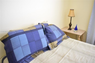 This furnished, turnkey, top floor condo features all new on Sunrise Lakes Phase III in Florida - for sale on GolfHomes.com, golf home, golf lot