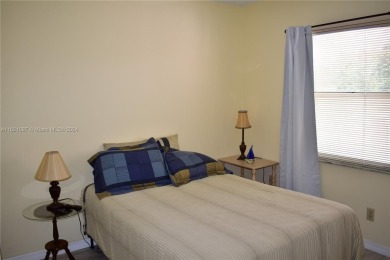 This furnished, turnkey, top floor condo features all new on Sunrise Lakes Phase III in Florida - for sale on GolfHomes.com, golf home, golf lot