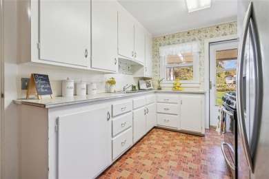 Welcome to 1440 Roanoke Ave, a charming cape-style home nestled on Sandy Pond Golf Course in New York - for sale on GolfHomes.com, golf home, golf lot