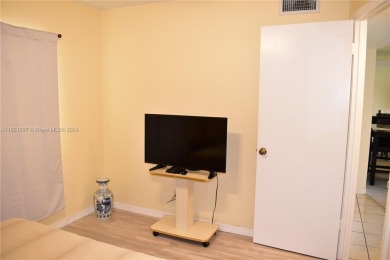 This furnished, turnkey, top floor condo features all new on Sunrise Lakes Phase III in Florida - for sale on GolfHomes.com, golf home, golf lot