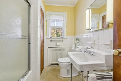 Welcome to 1440 Roanoke Ave, a charming cape-style home nestled on Sandy Pond Golf Course in New York - for sale on GolfHomes.com, golf home, golf lot
