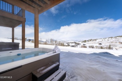 Experience immediate mountain living with this turnkey 3-story on Headwaters Golf Course At Granby Ranch in Colorado - for sale on GolfHomes.com, golf home, golf lot