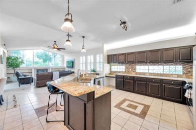 Welcome to this executive style 4 Bedroom, 3 Bath, 3 Car Garage on Crescent Oaks Country Club in Florida - for sale on GolfHomes.com, golf home, golf lot