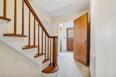 Welcome to 1440 Roanoke Ave, a charming cape-style home nestled on Sandy Pond Golf Course in New York - for sale on GolfHomes.com, golf home, golf lot