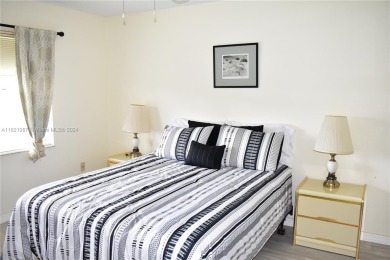 This furnished, turnkey, top floor condo features all new on Sunrise Lakes Phase III in Florida - for sale on GolfHomes.com, golf home, golf lot