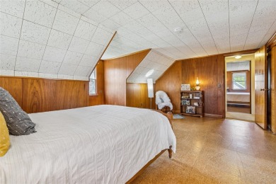 Welcome to 1440 Roanoke Ave, a charming cape-style home nestled on Sandy Pond Golf Course in New York - for sale on GolfHomes.com, golf home, golf lot