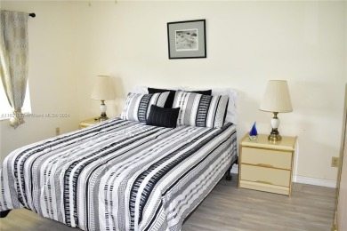This furnished, turnkey, top floor condo features all new on Sunrise Lakes Phase III in Florida - for sale on GolfHomes.com, golf home, golf lot