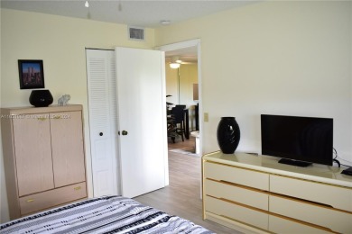 This furnished, turnkey, top floor condo features all new on Sunrise Lakes Phase III in Florida - for sale on GolfHomes.com, golf home, golf lot