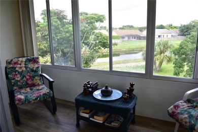 This furnished, turnkey, top floor condo features all new on Sunrise Lakes Phase III in Florida - for sale on GolfHomes.com, golf home, golf lot