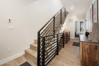 Experience immediate mountain living with this turnkey 3-story on Headwaters Golf Course At Granby Ranch in Colorado - for sale on GolfHomes.com, golf home, golf lot