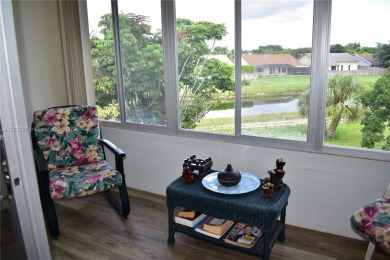 This furnished, turnkey, top floor condo features all new on Sunrise Lakes Phase III in Florida - for sale on GolfHomes.com, golf home, golf lot