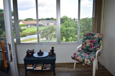This furnished, turnkey, top floor condo features all new on Sunrise Lakes Phase III in Florida - for sale on GolfHomes.com, golf home, golf lot