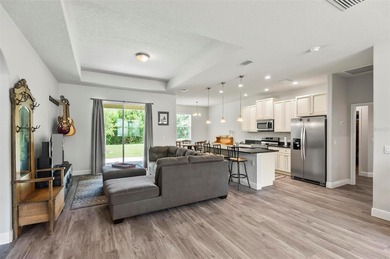 The beach is certainly within reach on this 3 bedroom, 2 bath, 2 on The Grand Club Cypress Course in Florida - for sale on GolfHomes.com, golf home, golf lot