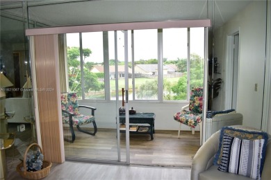 This furnished, turnkey, top floor condo features all new on Sunrise Lakes Phase III in Florida - for sale on GolfHomes.com, golf home, golf lot
