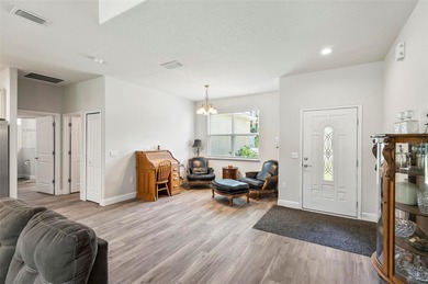 The beach is certainly within reach on this 3 bedroom, 2 bath, 2 on The Grand Club Cypress Course in Florida - for sale on GolfHomes.com, golf home, golf lot