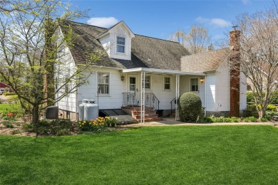Welcome to 1440 Roanoke Ave, a charming cape-style home nestled on Sandy Pond Golf Course in New York - for sale on GolfHomes.com, golf home, golf lot