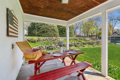 Welcome to 1440 Roanoke Ave, a charming cape-style home nestled on Sandy Pond Golf Course in New York - for sale on GolfHomes.com, golf home, golf lot
