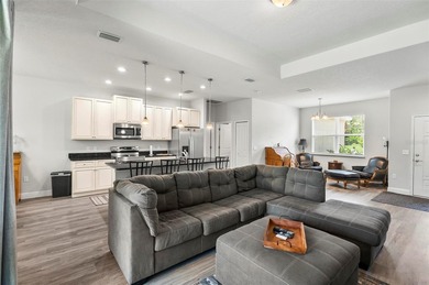 The beach is certainly within reach on this 3 bedroom, 2 bath, 2 on The Grand Club Cypress Course in Florida - for sale on GolfHomes.com, golf home, golf lot