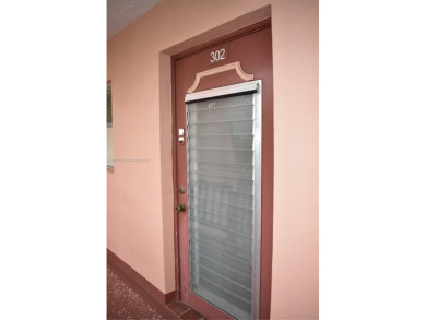 This furnished, turnkey, top floor condo features all new on Sunrise Lakes Phase III in Florida - for sale on GolfHomes.com, golf home, golf lot