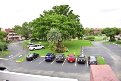 This furnished, turnkey, top floor condo features all new on Sunrise Lakes Phase III in Florida - for sale on GolfHomes.com, golf home, golf lot