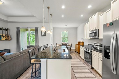 The beach is certainly within reach on this 3 bedroom, 2 bath, 2 on The Grand Club Cypress Course in Florida - for sale on GolfHomes.com, golf home, golf lot