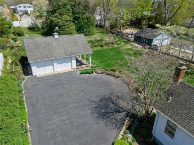 Welcome to 1440 Roanoke Ave, a charming cape-style home nestled on Sandy Pond Golf Course in New York - for sale on GolfHomes.com, golf home, golf lot