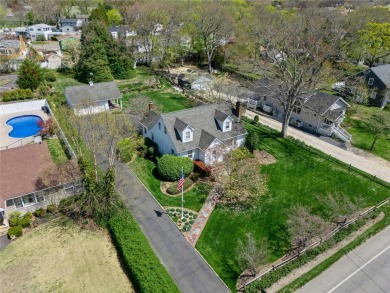 Welcome to 1440 Roanoke Ave, a charming cape-style home nestled on Sandy Pond Golf Course in New York - for sale on GolfHomes.com, golf home, golf lot
