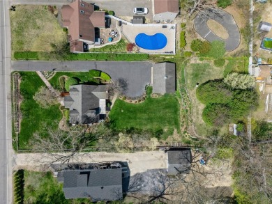 Welcome to 1440 Roanoke Ave, a charming cape-style home nestled on Sandy Pond Golf Course in New York - for sale on GolfHomes.com, golf home, golf lot
