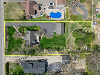Welcome to 1440 Roanoke Ave, a charming cape-style home nestled on Sandy Pond Golf Course in New York - for sale on GolfHomes.com, golf home, golf lot