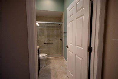 This oversized Lantana waterfront home with rare Water and Golf on Glenview Championship Golf and Country Club in Florida - for sale on GolfHomes.com, golf home, golf lot