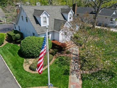 Welcome to 1440 Roanoke Ave, a charming cape-style home nestled on Sandy Pond Golf Course in New York - for sale on GolfHomes.com, golf home, golf lot