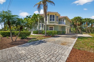 Welcome to 779 Pyrula Avenue, a beautiful and unique island on Beachview Golf Club in Florida - for sale on GolfHomes.com, golf home, golf lot