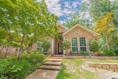 Welcome to your dream home in the charming Hideaway community! on Hide-A-Way Lake Golf Course in Texas - for sale on GolfHomes.com, golf home, golf lot