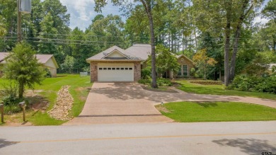 Welcome to your dream home in the charming Hideaway community! on Hide-A-Way Lake Golf Course in Texas - for sale on GolfHomes.com, golf home, golf lot