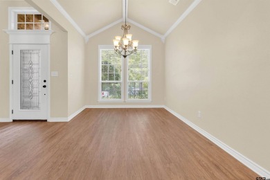 Welcome to your dream home in the charming Hideaway community! on Hide-A-Way Lake Golf Course in Texas - for sale on GolfHomes.com, golf home, golf lot
