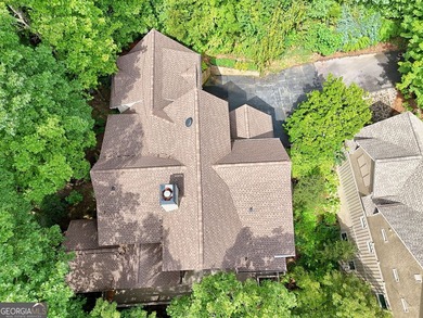 Nestled in the coveted Waterfall at Lake Burton community, this on Waterfall Country Club in Georgia - for sale on GolfHomes.com, golf home, golf lot