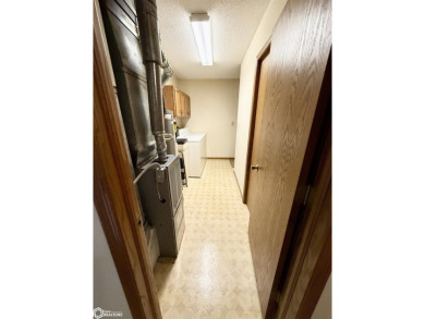 Location, location, location! Just a short jaunt to the Carroll on Carroll Municipal Golf Course in Iowa - for sale on GolfHomes.com, golf home, golf lot