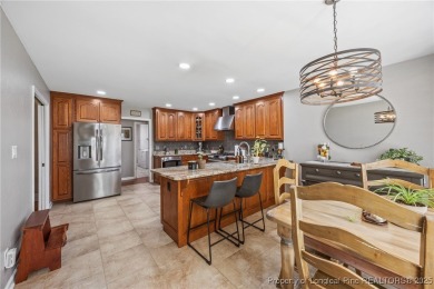 Pristine home in the desirable Cypress Lakes golf community! on Cypress Lakes Golf Course in North Carolina - for sale on GolfHomes.com, golf home, golf lot