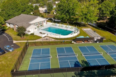 Welcome Home to Southern Charm at the Beach! Nestled in one of on Tupelo Bay Golf Complex  in South Carolina - for sale on GolfHomes.com, golf home, golf lot