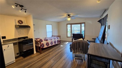 Adorable one bedroom, open kitchen to living Room, Manufactured on Pennbrooke Fairways in Florida - for sale on GolfHomes.com, golf home, golf lot