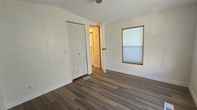 Adorable one bedroom, open kitchen to living Room, Manufactured on Pennbrooke Fairways in Florida - for sale on GolfHomes.com, golf home, golf lot