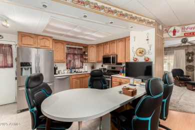 Tucked away on a private corner cul-de-sac lot, this beautifully on Fountain of the Sun Country Club in Arizona - for sale on GolfHomes.com, golf home, golf lot