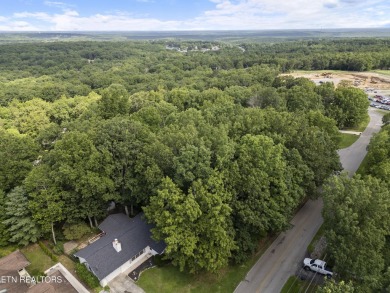 This cozy 3 bedroom/2 bath home features vinyl siding, fenced on Druid Hills Golf Club in Tennessee - for sale on GolfHomes.com, golf home, golf lot